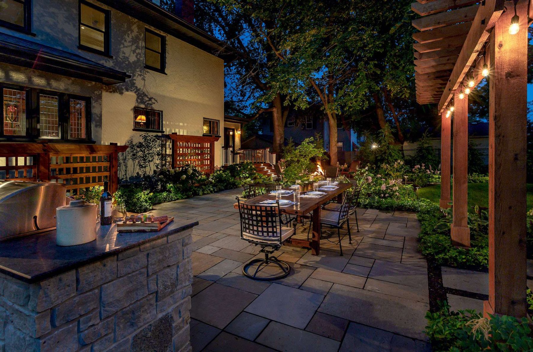 patio with landscape lighting installed